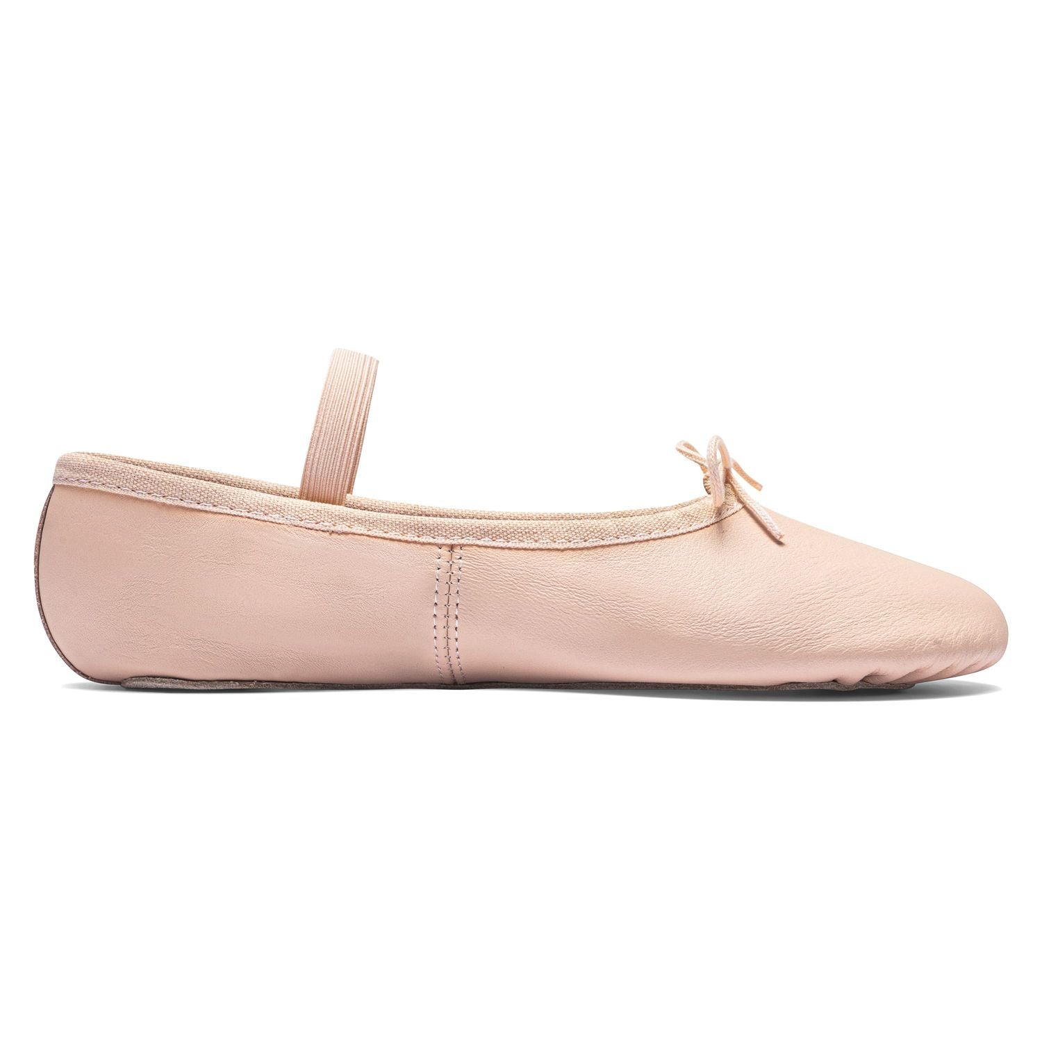 Seitenansicht von Rumpfs rosa 1001 Ballettschläppchen Leder mit Schleife, Gummiband und Chromledersohle auf weißem Hintergrund.